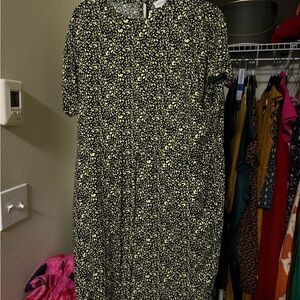 Floral Print Black Dress with drawstring and pockets.